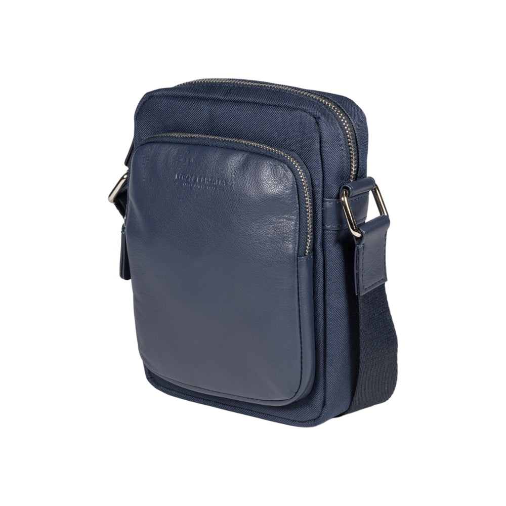 RB2002D | Nylon/Vera Leather Shoulder Bag, with light grain. Zipper closure and adjustable shoulder strap - Blue color - Size: 15.5 x 21 x 7 cm. Packaging: Non-Woven Fabric Bag-0